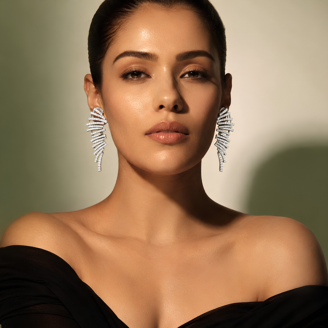 Nova feather glow earrings